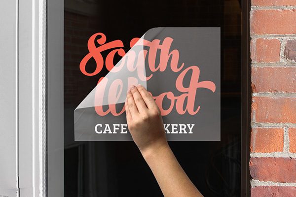 Shop front glass decorated with printed vinyl graphics